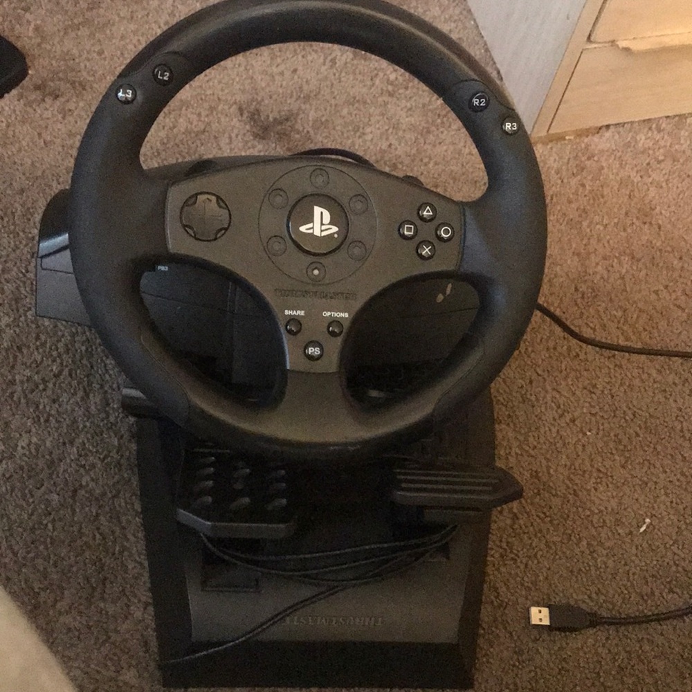 50$ ps4  steering wheel and pedals